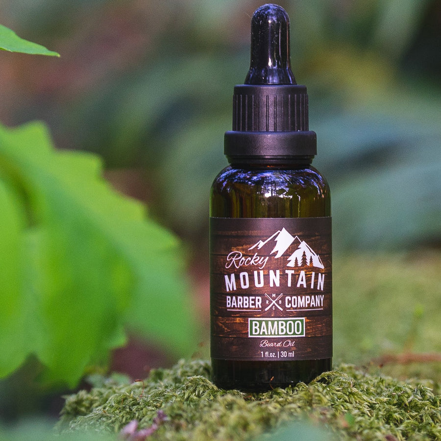 Rocky Mountain Barber Company Bamboo Beard Oil Outdoors in Nature on Wood with Moss