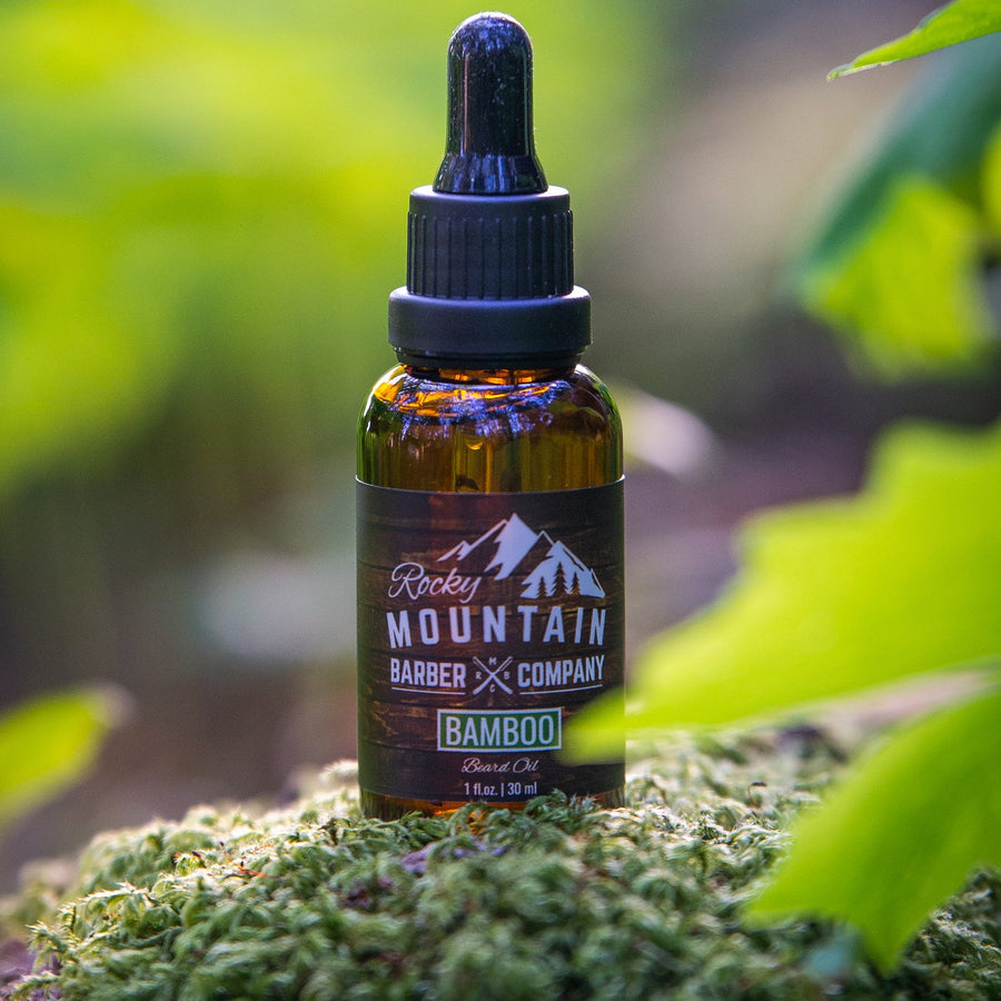 Rocky Mountain Barber Company Bamboo Beard Oil Outdoors in Nature on Wood with Moss